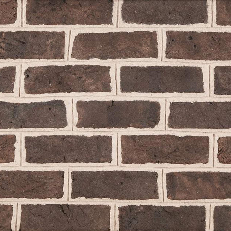 Bessemer Grey #410 is a beautiful hand molded thin brick has warm complementary greys supplemented with the pure rich color of milk chocolate.