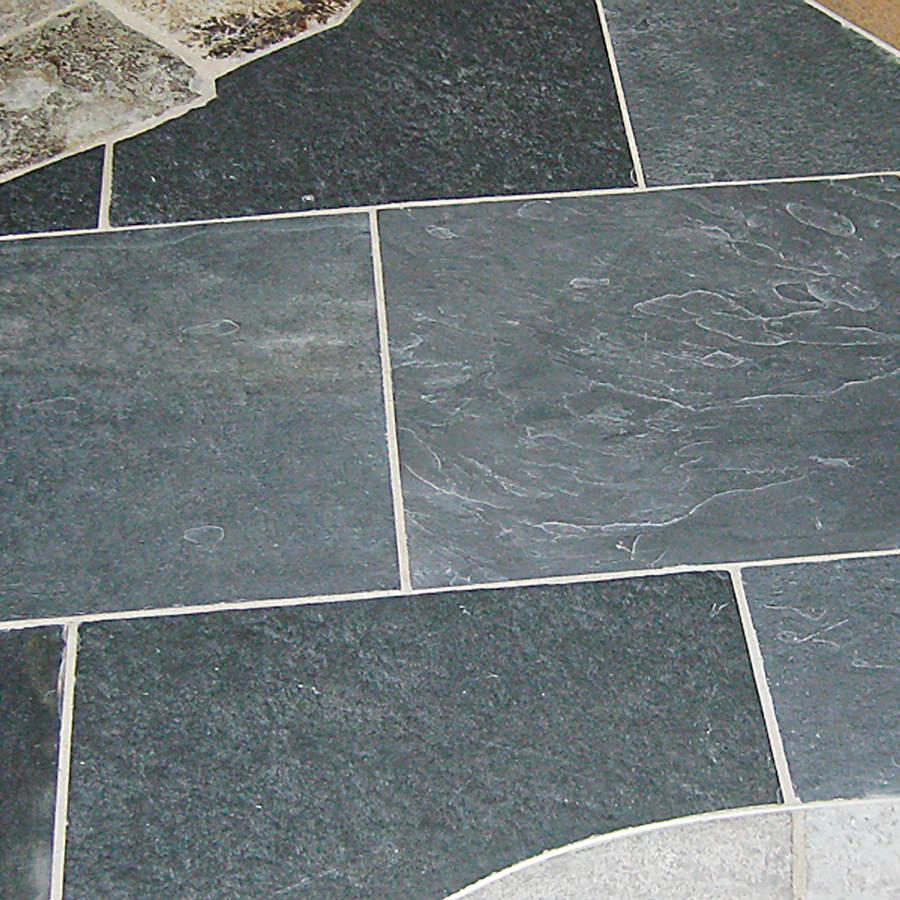 Black Slate tile is a black sable color with an elegant rough texture to create a stone of subtle refinement.