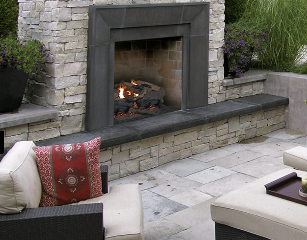 Enhance your architectural projects with Fond du Lac Country Squire thin veneer cut stone like this outdoor fireplace