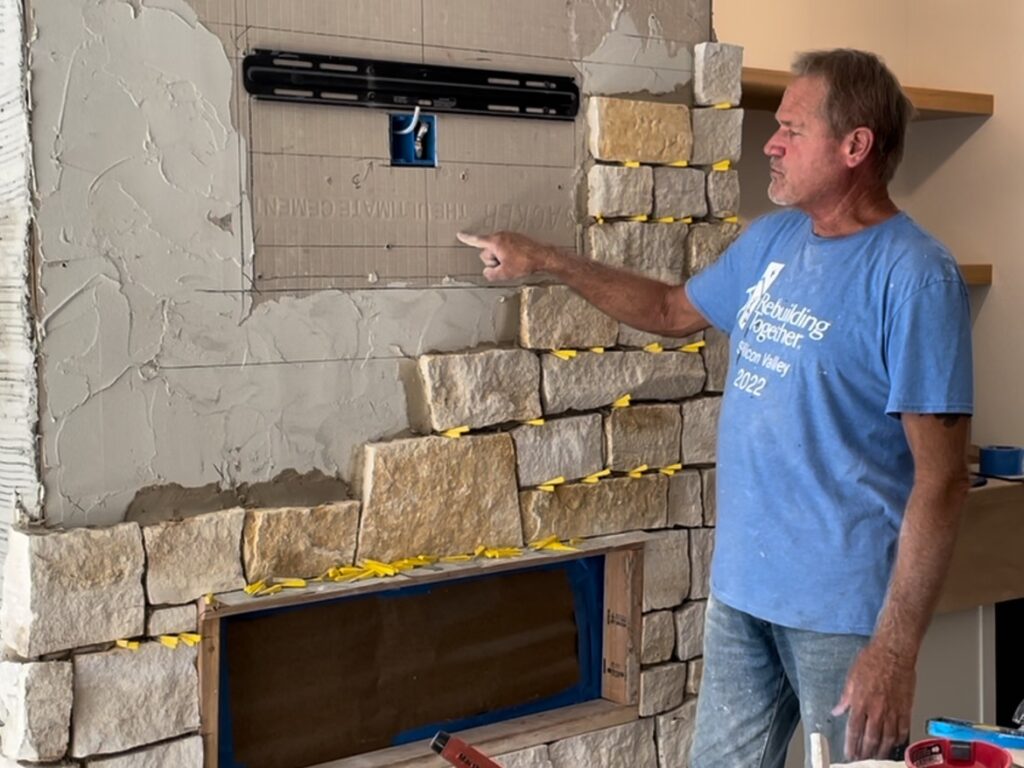 see how to install natural stone thin veneer for a fireplace surround in your home.
