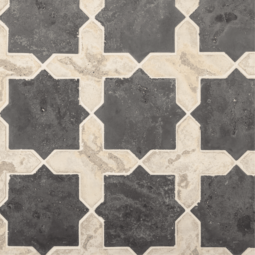Close-up of Artillo Arabesque Pattern 2C Magnolia tile showcasing dark charcoal and ivory tones