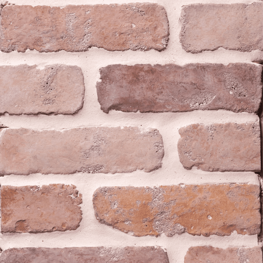 Close-up view of Antik Creme Fraiche Brick Veneer showcasing reclaimed-style texture