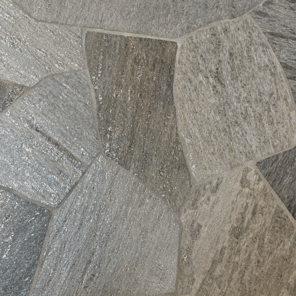 Close-up of Idaho Birch Creek Quartzite Flagstone showing warm gray tones, subtle texture, and consistent mica shimmer in an irregular pattern