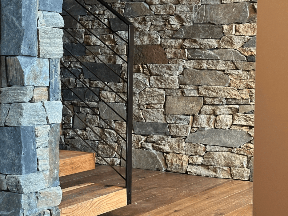 Finished tight-fit natural stone veneer wall showing the grout-free, hand-laid look