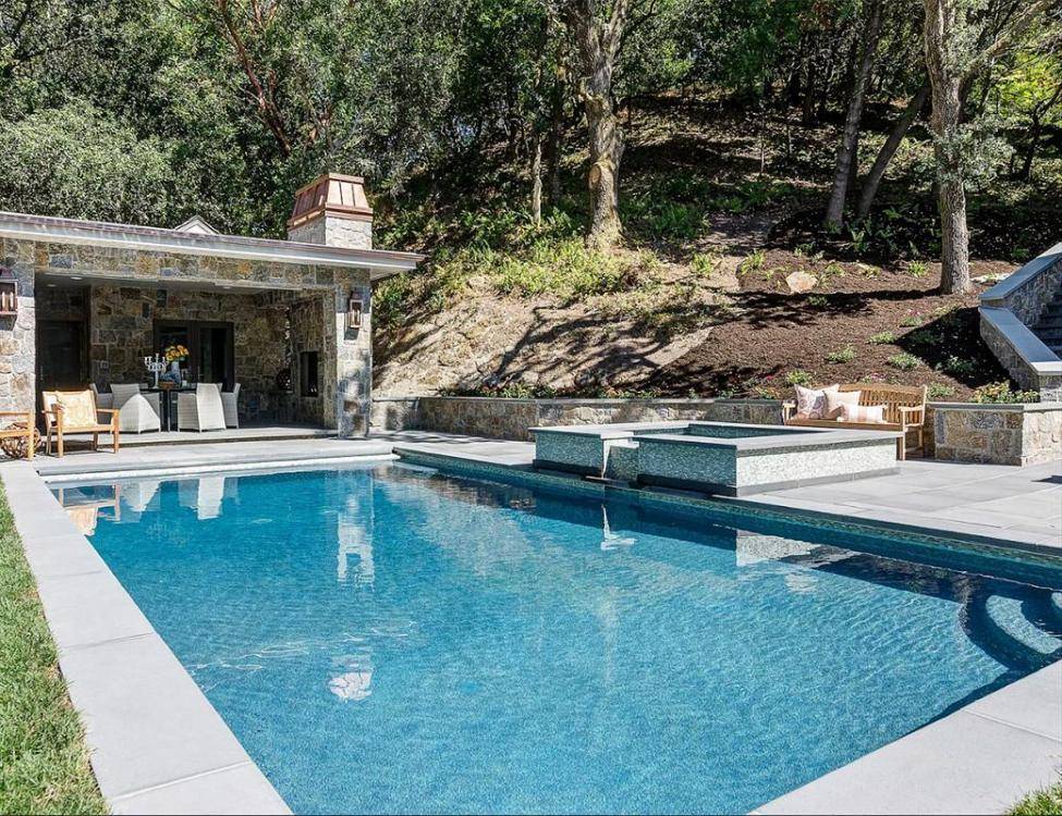 Natural Stone: Bluestone pavers and pool coping