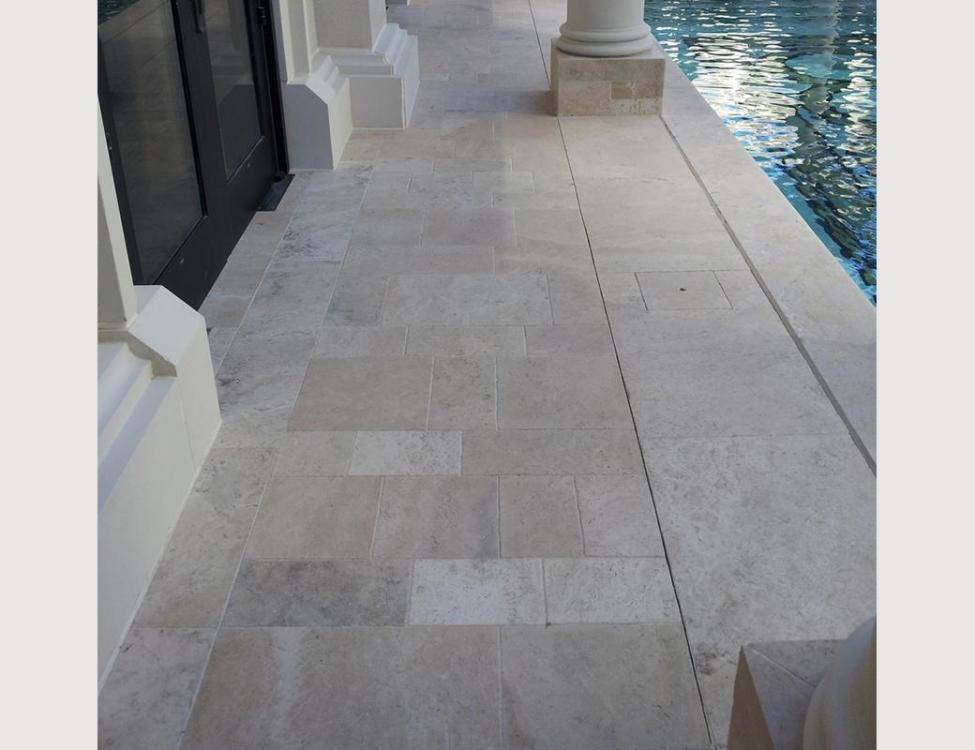 Peruvian Travertine random stone pattern for pool deck and pool coping